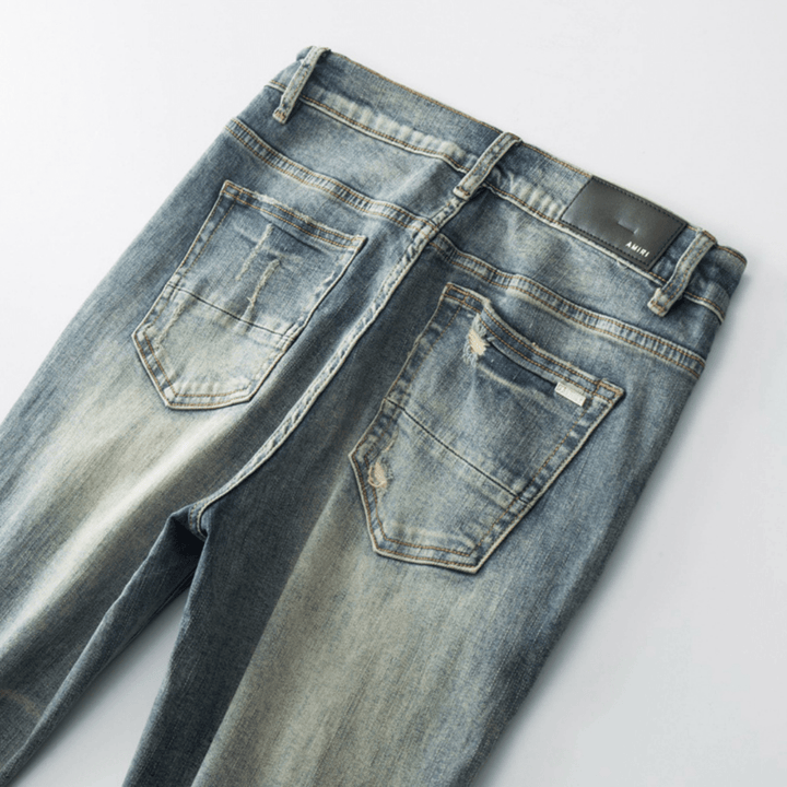 Amr Ripped Patch Jeans - Nov - ell - fas - ion