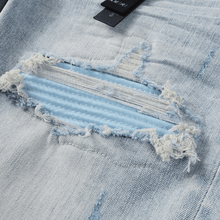 Amr Blue Patch Distressed Jeans - Novell "Fashion"