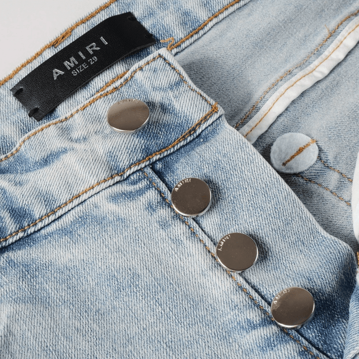 Amr Blue Patch Distressed Jeans - Novell "Fashion"