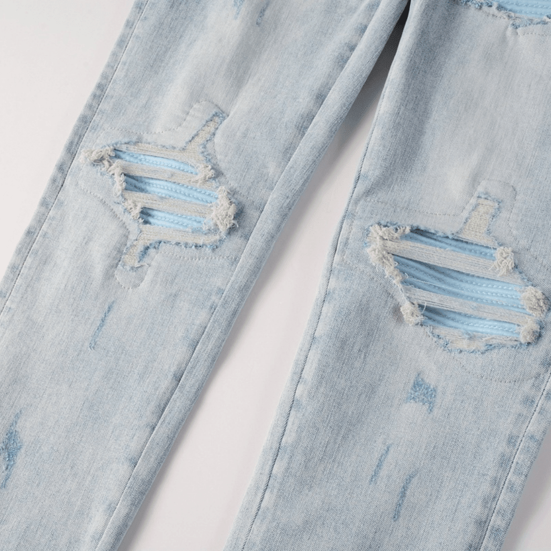 Amr Blue Patch Distressed Jeans - Novell "Fashion"