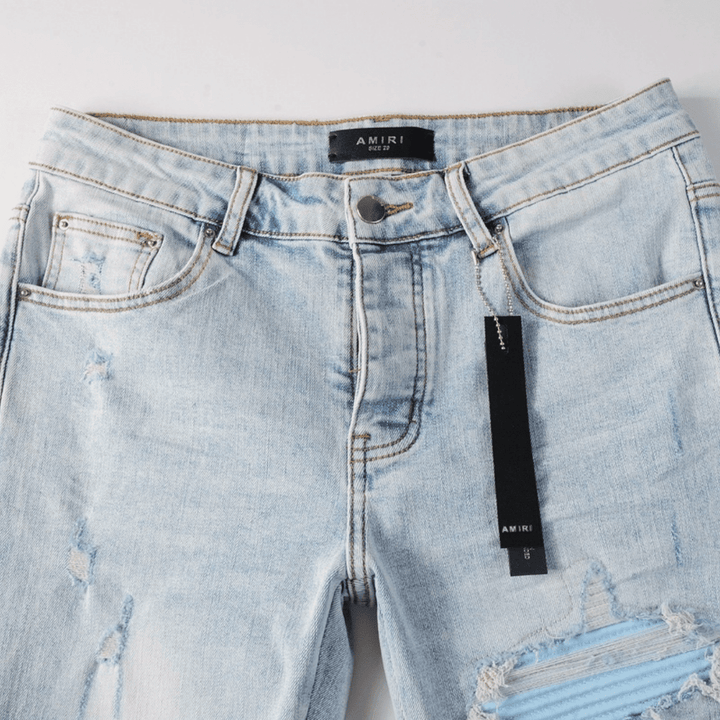 Amr Blue Patch Distressed Jeans - Novell "Fashion"
