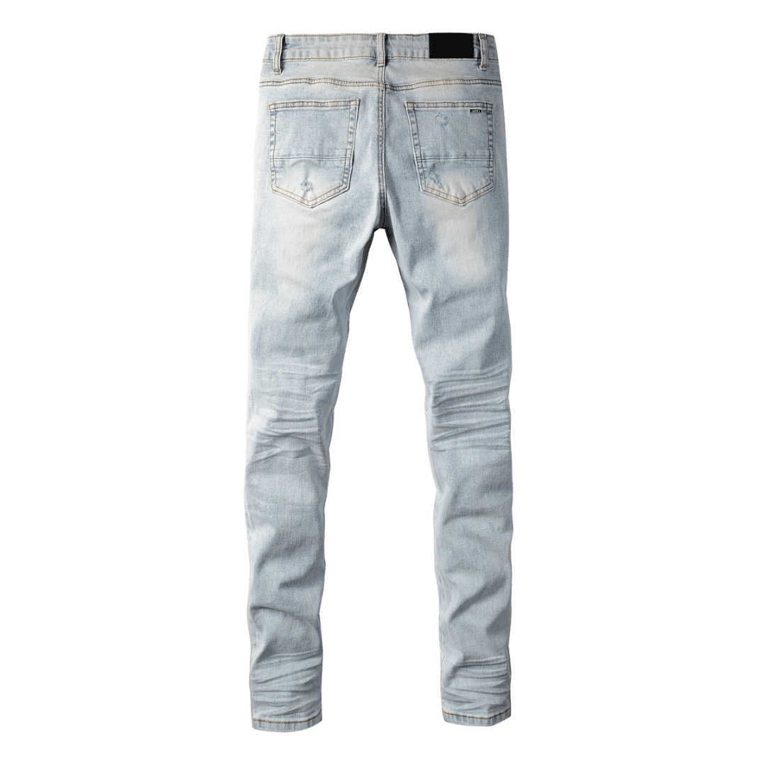 Amr Blue Patch Distressed Jeans - Novell "Fashion"