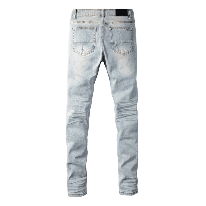 Amr Blue Patch Distressed Jeans - Novell "Fashion"