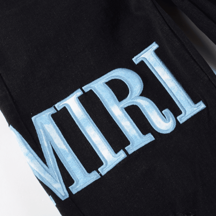 Amr Blue Patch Jeans - Novell "Fashion"