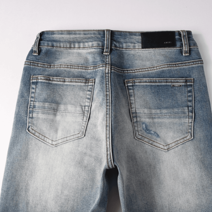 Amr Blue Patch Ripped Jeans - Novell "Fashion"