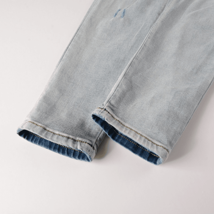 Amr Logo Distressed Jeans - Novell "Fashion"