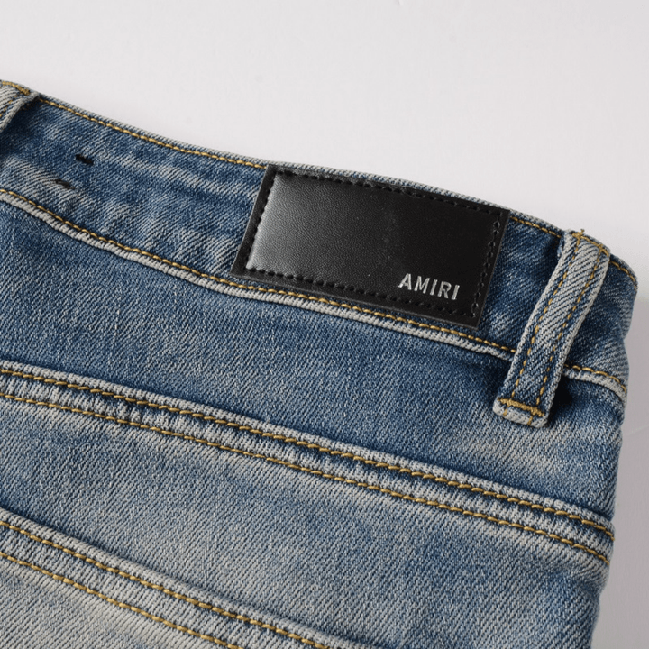 Amr Patch Distressed Jeans - Novell "Fashion"