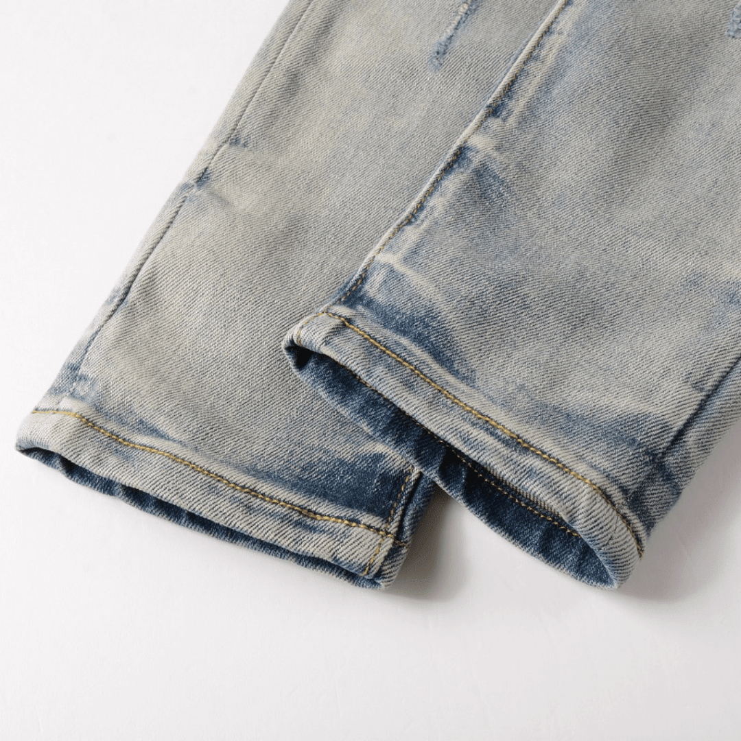 Amr Patch Distressed Jeans - Novell "Fashion"