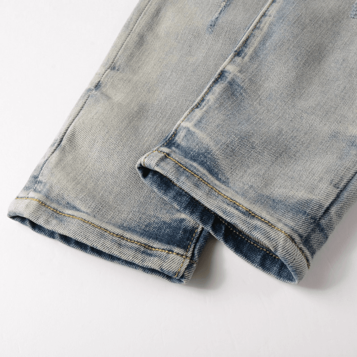 Amr Patch Distressed Jeans - Novell "Fashion"
