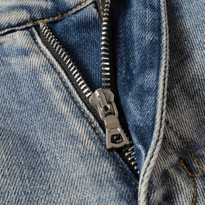 Amr Patch Distressed Jeans - Novell "Fashion"