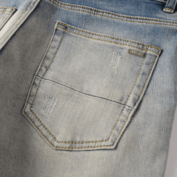 Amr Patch Distressed Jeans - Novell "Fashion"
